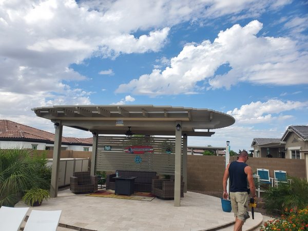 Curved aluminum patio shade cover example for Boulder City area homeowners.