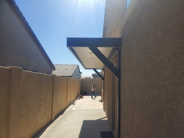 Side-yard attached aluminum patio cover for Centennial Hills area homes.