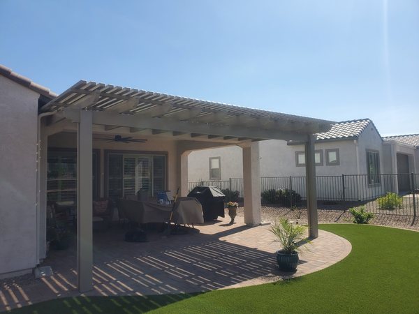 Lattice patio cover over backyard seating for Boulder City area homes.