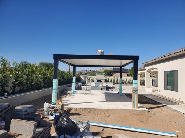 Poolside freestanding shade cover for Henderson area outdoor living.