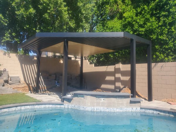 Small freestanding aluminum patio cover for Boulder City area backyards.