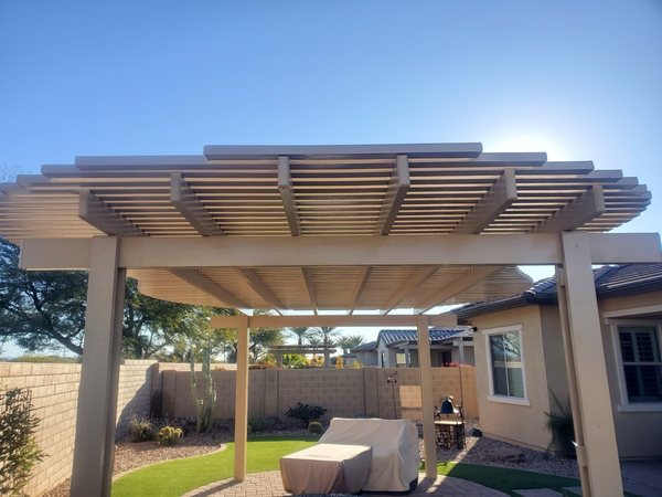 Tan lattice outdoor room patio cover for Anthem area homeowners.