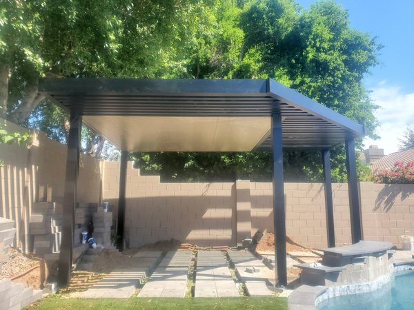 Freestanding spa shade cover for Green Valley area backyards.
