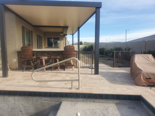 Small attached solid patio cover for Mesquite area homeowners.